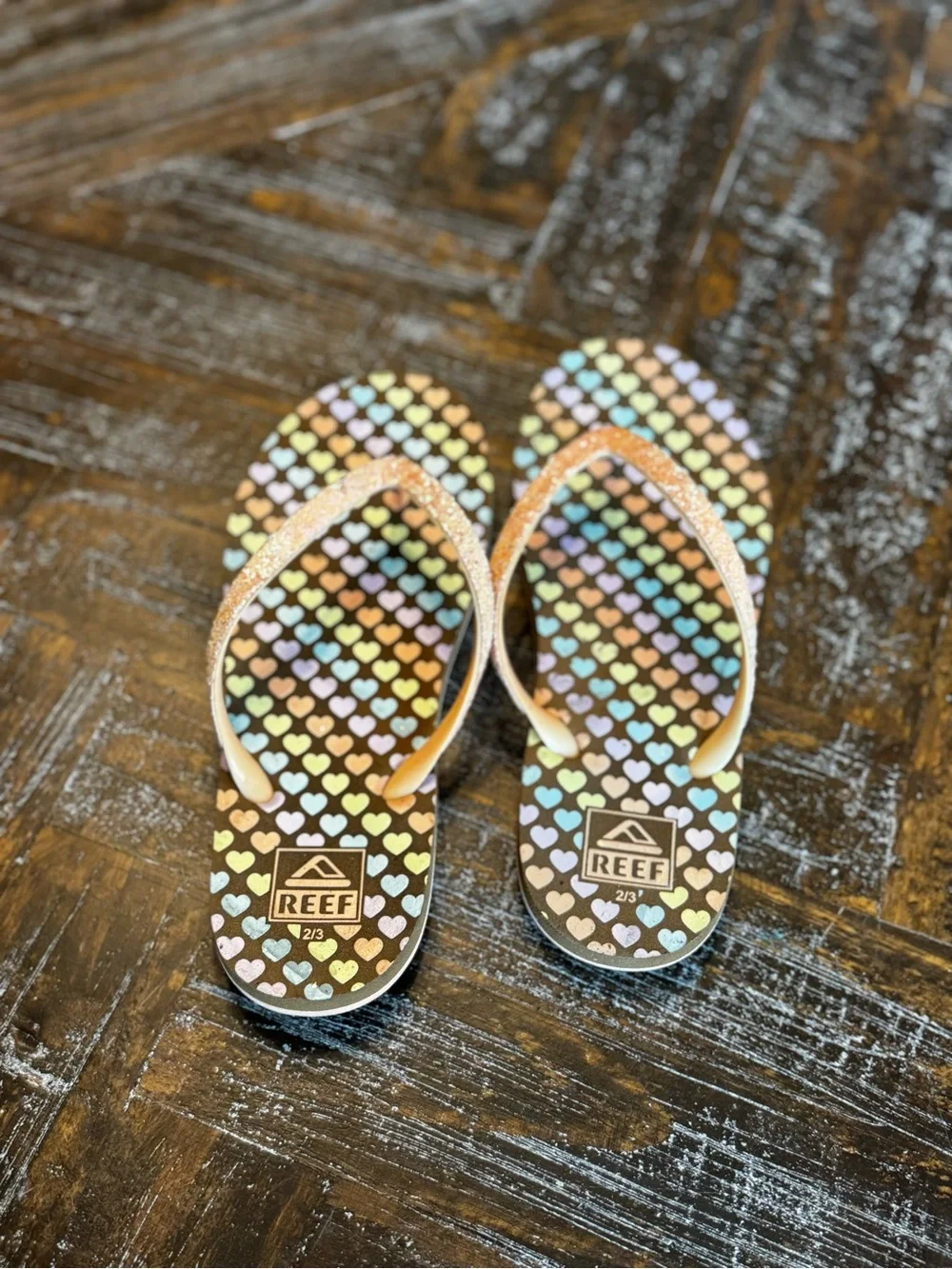 Reef Kids Flip Flops in Multicolor Heart Print with Pink Glitter Straps